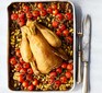 Summer roast chicken traybake served in a roasting tin