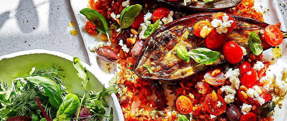 Roast puttanesca aubergines with Roast puttanesca aubergines with tomato rice & feta