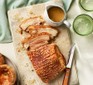 Air-fryer pork belly carved into slices on a serving platter