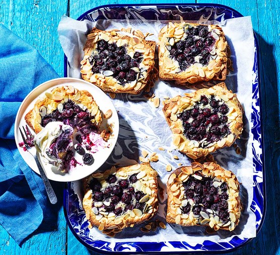 Several blueberry bostocks on a serving tray