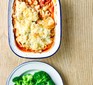 Seafood bake topped with potatoes and cheese