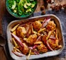 One-pan hot honey & mustard parsnips & chicken thigh traybake served with peas