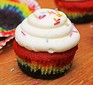 A single rainbow cupcake