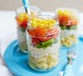 Three jars filled with rainbow salad pots