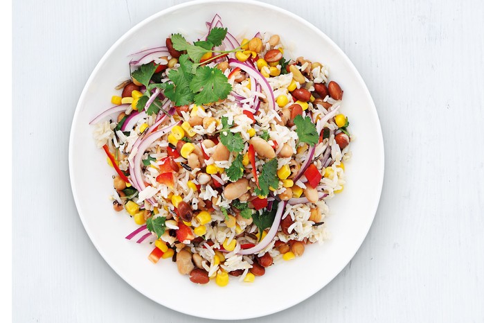 Plate of wild rice with sweetcorn and other vegetables