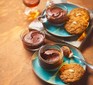 Olive oil chocolate mousse in a ramekin with PX & almond biscuits