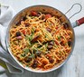 Spaghetti puttanesca served in a pan