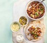 Smoky mushroom & chickpea fajitas with charred spring onion salsa alongside