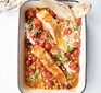 Spiced salmon & tomato traybake served in a roasting tin