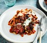 Plate of slow cooker vegetable lasagne with cutlery